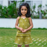 Girl wearing Green cotton pajama set with shorts