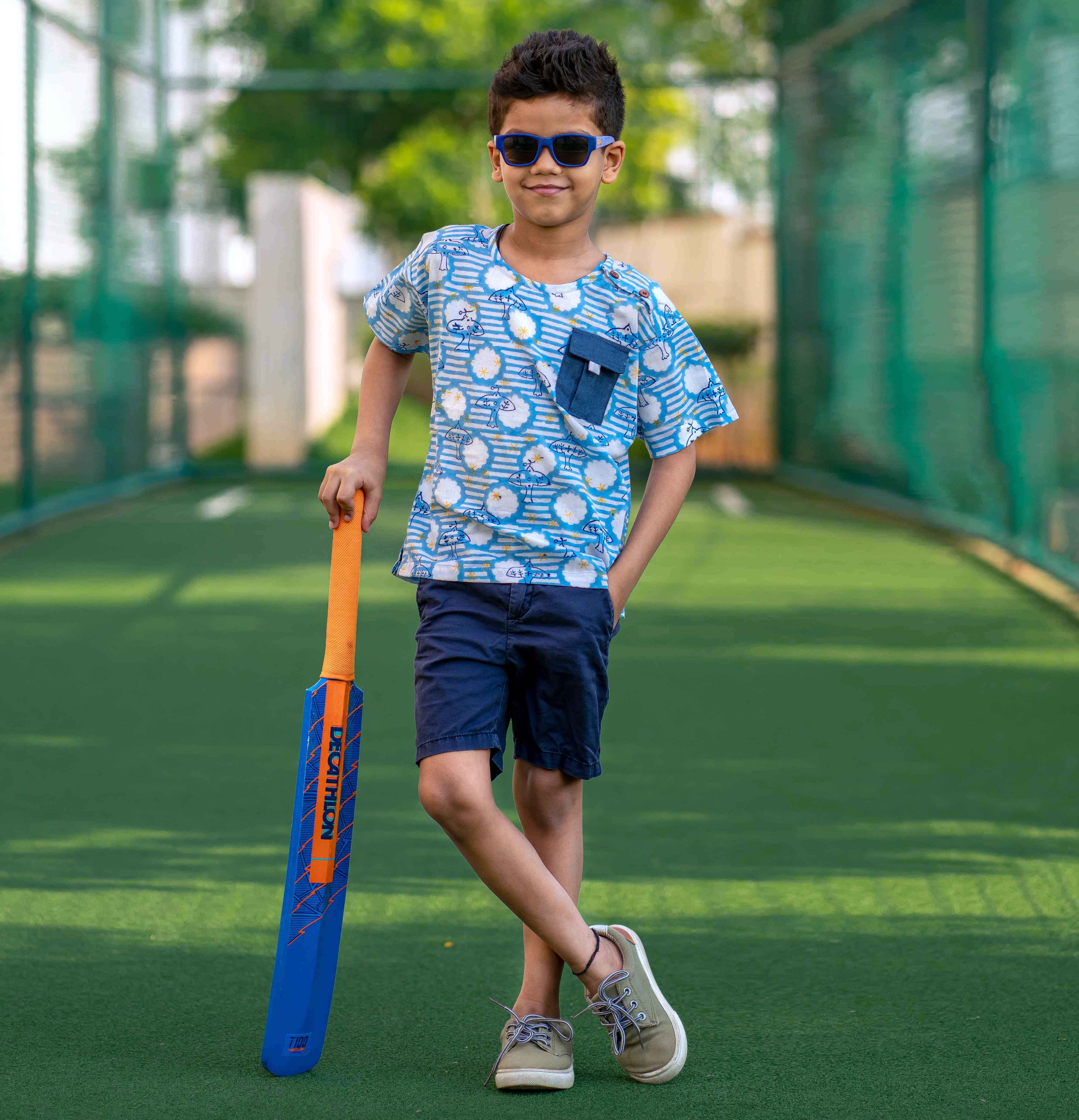 A boy wearing Blue block print cotton shirt with contrast pocket