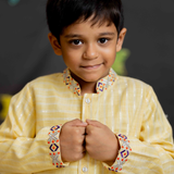Yellow kurta and white dhoti set