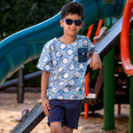 A boy wearing Blue block print cotton shirt with contrast pocket
