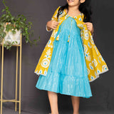 Mustard overcoat and blue lurex frock girls