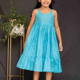 Mustard overcoat and blue lurex frock girls