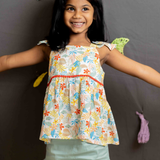 Floral top and green frill shorts