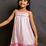 Pink gingham strappy frock with lace trim