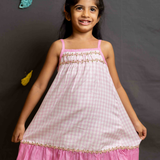 Pink gingham strappy frock with lace trim