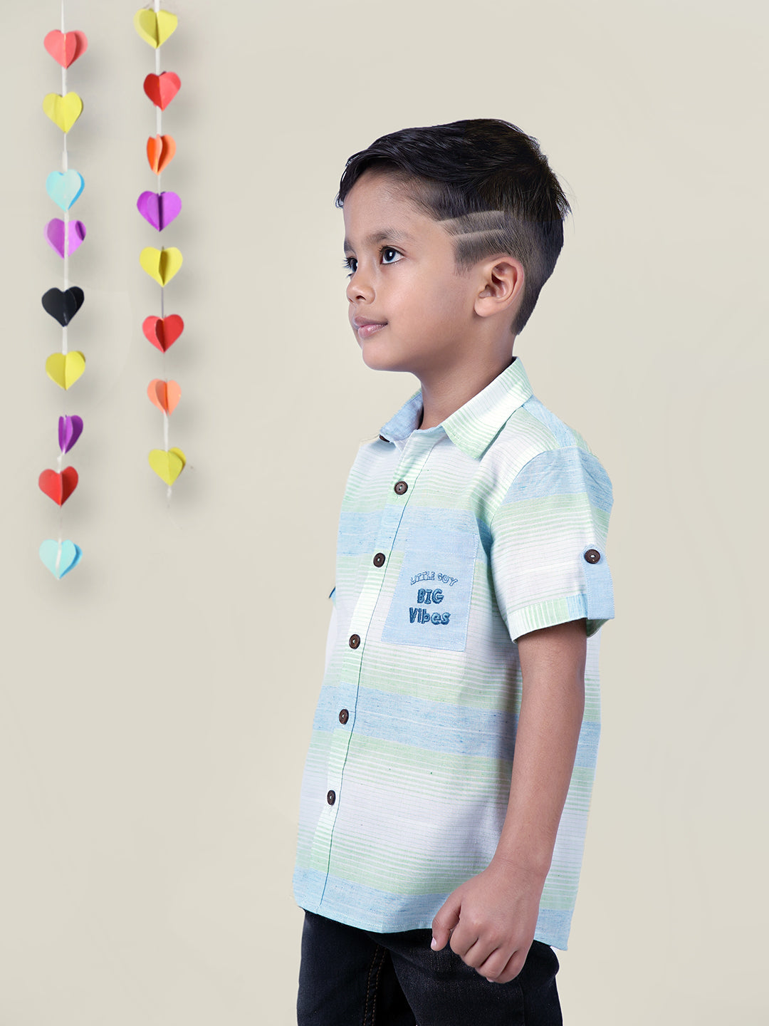 Boy wearing Blue Stripes shirt with Big Vibes written on It