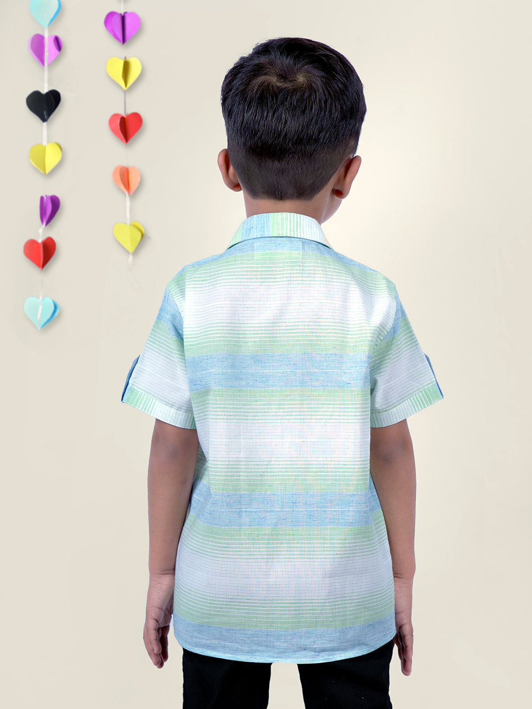 Boy wearing Blue Stripes shirt with Big Vibes written on It