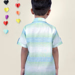 Boy wearing Blue Stripes shirt with Big Vibes written on It