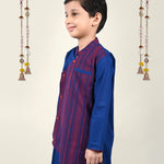 A boy Wearing Blue Asymmnetric Kurta
