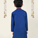 A boy Wearing Blue Asymmnetric Kurta