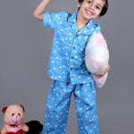 Boy wearing Blue Cotton night suit with ducks printed on it