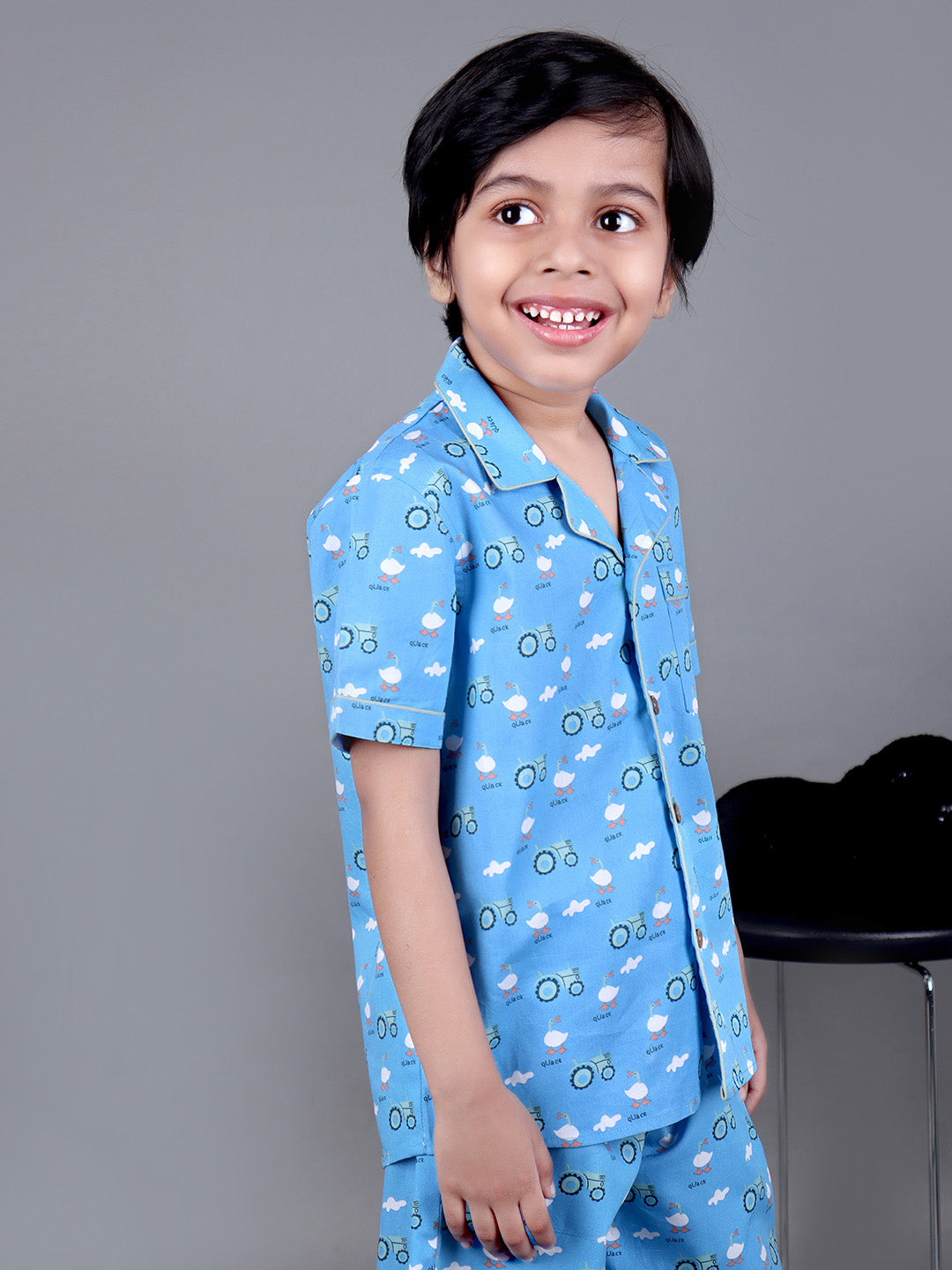 Boy wearing Blue Cotton night suit with ducks printed on it