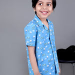 Boy wearing Blue Cotton night suit with ducks printed on it