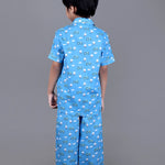 Boy wearing Blue Cotton night suit with ducks printed on it