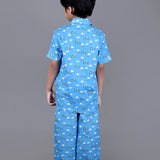 Boy wearing Blue Cotton night suit with ducks printed on it