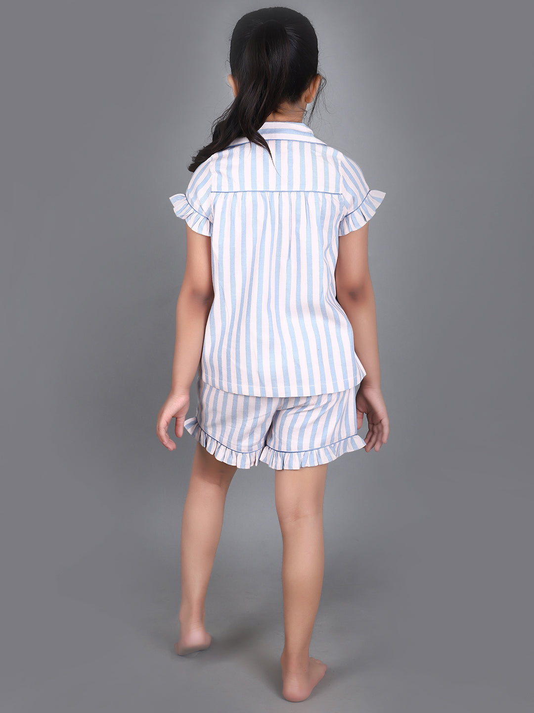 A girl wearing Blue striped cotton night dress with shorts