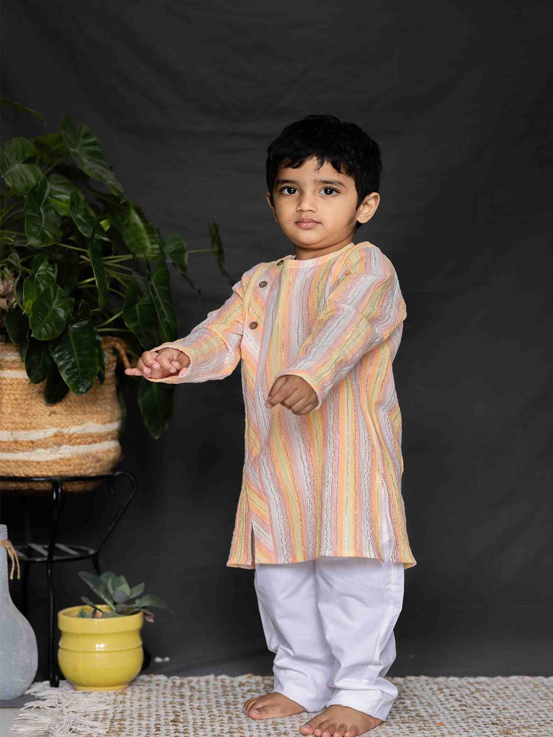 Boy wearing Stripes Kurta and White Pants