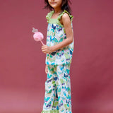 A girl wearing butterfly printed cotton suit with capri