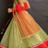 Green shimmer net lehenga set