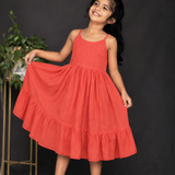 Orange strappy frock with floral overcoat