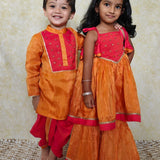 Orange and red boys kurta and dhoti set