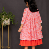 Orange strappy frock with floral overcoat